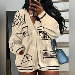 Patchwork cream cardigan trimmed in black